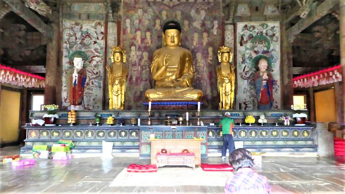 A golden Buddha inside the Bulguska Temple