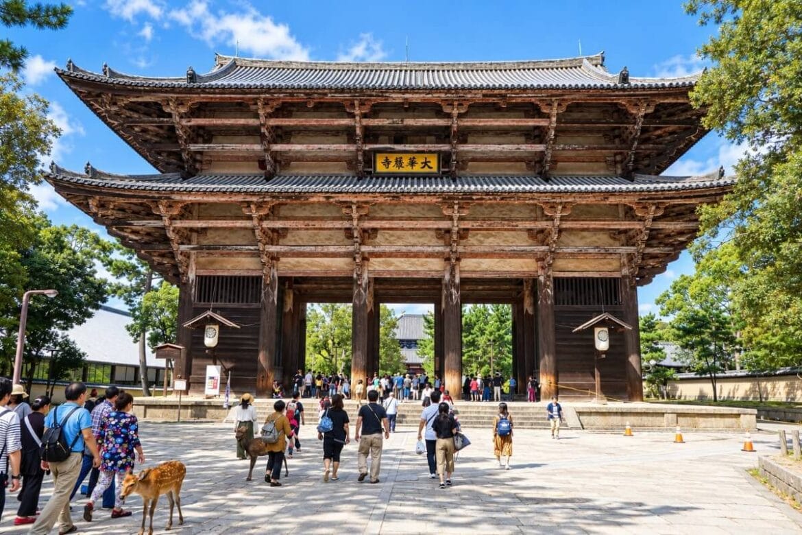 Great South Gate of Todai-ji Temple in Nara with visitors and deer